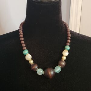 Elegant Beaded Necklace with Brown and Blue Accents Costume Jewelry